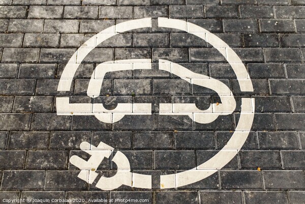 Roadsign of free electric car charging station in a European supermarket parking lot. Picture Board by Joaquin Corbalan