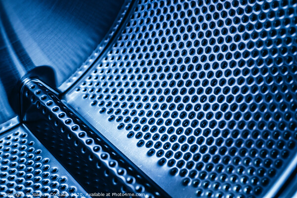 Detail of the drum of a washing machine, steel industrial texture with holes. Picture Board by Joaquin Corbalan