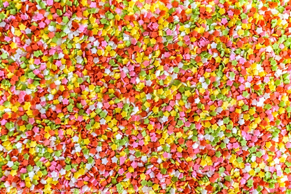 Close-up of colorful little stars made of sugar to decorate desserts, culinary background. Picture Board by Joaquin Corbalan