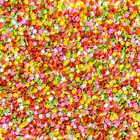 Buy canvas prints of Close-up of colorful little stars made of sugar to decorate desserts, culinary background. by Joaquin Corbalan