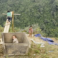 Buy canvas prints of Children from villages in the mountainous area of ​​Sapa, north of Vietnam, expecting to see Western tourists. by Joaquin Corbalan