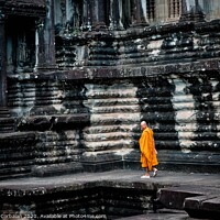 Buy canvas prints of tibetan monks in orange robes visiting remote Cambodian temples to meditate. by Joaquin Corbalan