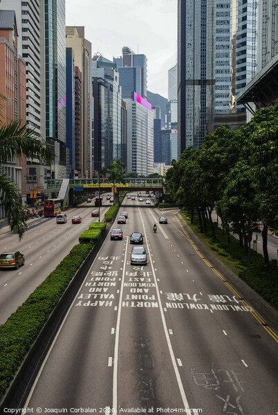  One of the main roads of the Chinese city with light traffic. Picture Board by Joaquin Corbalan
