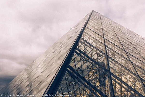 Crystal pyramid in Paris, sample of modern architecture on a cloudy day Picture Board by Joaquin Corbalan