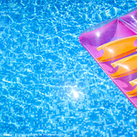 Buy canvas prints of Transparent water from a pool, background with summer colored floats. by Joaquin Corbalan