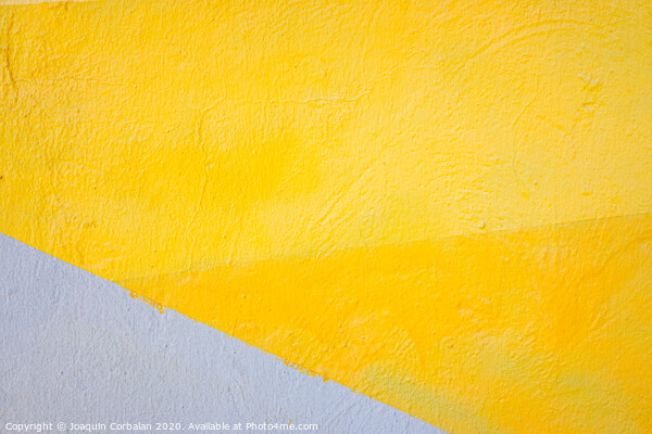 A wall painted with lines of various colors, yellow and orange tones. Picture Board by Joaquin Corbalan