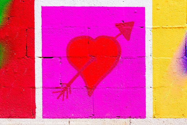 Heart pierced by a red arrow painted on a framed mural. Picture Board by Joaquin Corbalan