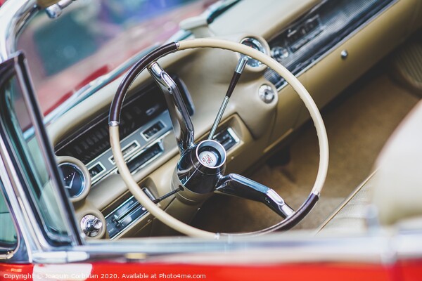 Valencia, Spain - July 21, 2012: Dashboard and steering wheel of a luxury vintage car, an American Mustang. Picture Board by Joaquin Corbalan