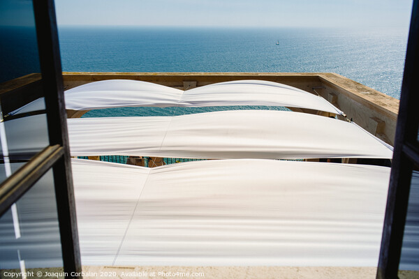 Serene sea seen from the window of a summer residence in the Mediterranean. Picture Board by Joaquin Corbalan