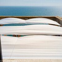 Buy canvas prints of Serene sea seen from the window of a summer residence in the Mediterranean. by Joaquin Corbalan