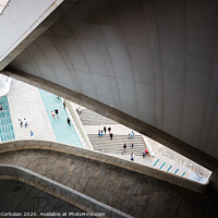 Buy canvas prints of Tourists walk the gardens around the Opera building, seen from inside. by Joaquin Corbalan