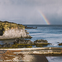 Buy canvas prints of Rainbow over the Icelandic coast in the middle of nature. by Joaquin Corbalan