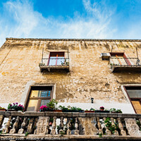 Buy canvas prints of Colorful and old alleys of the touristic Italian city of Bari. by Joaquin Corbalan