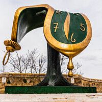 Buy canvas prints of Sculpture Dalí's melted clock displayed on the street on the occasion of the cultural capital of the city. by Joaquin Corbalan