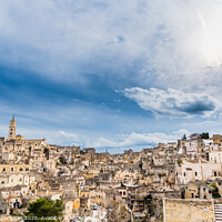 Buy canvas prints of Long panoramic views of the rocky old town of Matera with its stone roofs. by Joaquin Corbalan