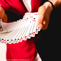 Buy canvas prints of Hands of magician doing tricks with a deck of cards. by Joaquin Corbalan