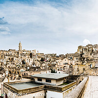Buy canvas prints of Long panoramic views of the rocky old town of Matera with its stone roofs. by Joaquin Corbalan