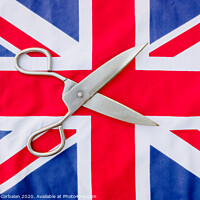 Buy canvas prints of A woman cuts with scissors the British flag in protest. by Joaquin Corbalan