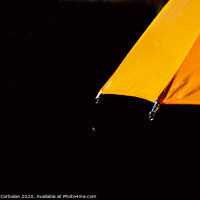 Buy canvas prints of Multicolored umbrella under raindrops isolated on black as background. by Joaquin Corbalan