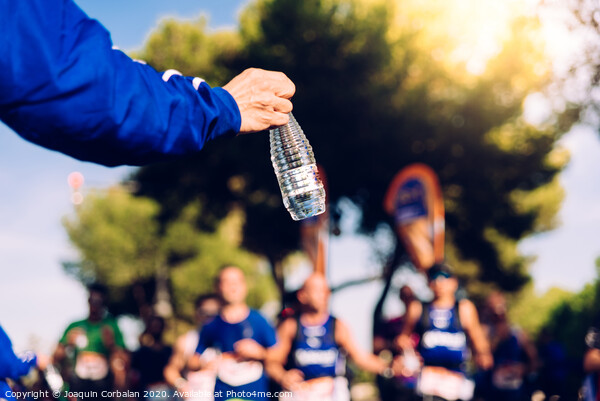 Drinking water is important when we exercise like running to avoid becoming dehydrated. Picture Board by Joaquin Corbalan