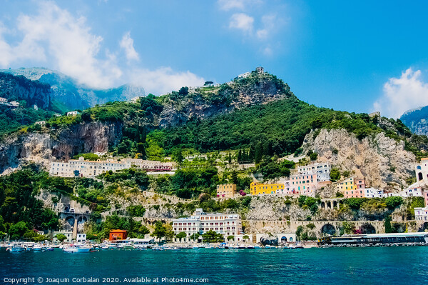 View from the sea of this picturesque Italian Mediterranean city, with old and colorful houses built on the side of a hill. Picture Board by Joaquin Corbalan
