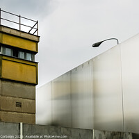 Buy canvas prints of Berlin, Germany - June 6, 2019: Watchtower next to a wall on a border to control illegal immigrants. by Joaquin Corbalan