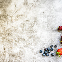 Buy canvas prints of Clean background with a lot of negative space for healthy food, with red fruits on one side. by Joaquin Corbalan