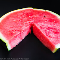 Buy canvas prints of A large slice of watermelon divided into smaller pieces, flat, red, isolated on a black background, as a data chart. by Joaquin Corbalan