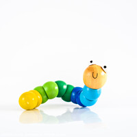 Buy canvas prints of Toy caterpillar with smile, to illustrate concepts of infant intestinal health. by Joaquin Corbalan