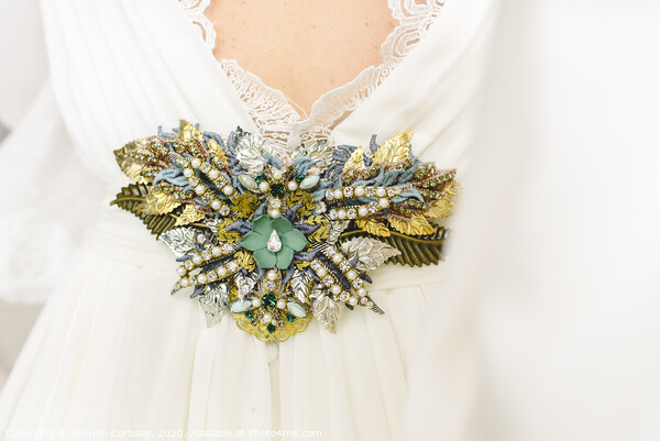 Flower shaped brooch made with small gemstones for a wedding dress. Picture Board by Joaquin Corbalan