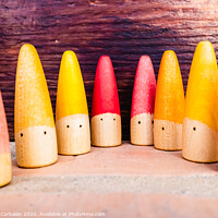 Buy canvas prints of Set of colored wooden conical fish toys for unstructured children's games. by Joaquin Corbalan