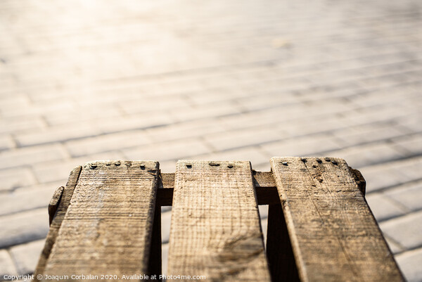 Image with a box aged wooden planks with blur background with copy space. Picture Board by Joaquin Corbalan