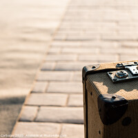 Buy canvas prints of Close-up detail of an old vintage suitcase with blur background with copy space. by Joaquin Corbalan