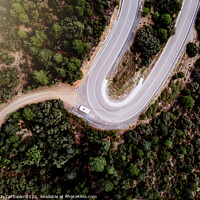 Buy canvas prints of Motorhome parked on the curve of a mountain road, seen from above, of some tourists on the road. by Joaquin Corbalan