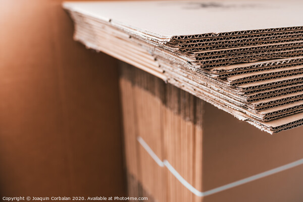 New unused cardboard boxes made from recycled material. Picture Board by Joaquin Corbalan