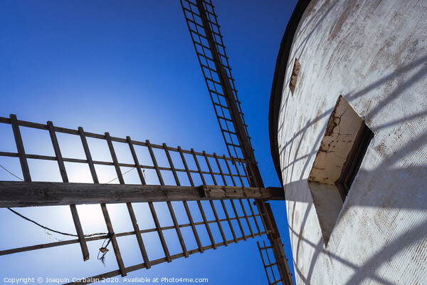 Traditional windmill of La Mancha, in Spain, protagonist of the famous novel Don Quixote. Picture Board by Joaquin Corbalan