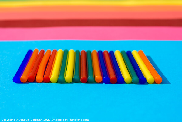 Colorful background of plastic bars, silicone glue, on a background of colored lines. Picture Board by Joaquin Corbalan