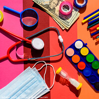 Buy canvas prints of School supplies cost money back to school after the pandemic. by Joaquin Corbalan