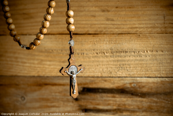 Rosary with wooden beads and Christian cross. Picture Board by Joaquin Corbalan