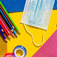 Buy canvas prints of Creativity at school is developed with colorful materials and with the protection of a mask to avoid contagion, flat lay background. by Joaquin Corbalan