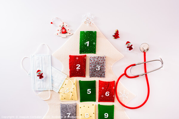 Traditional advent calendar protected with medical face masks, isolated on white background. Picture Board by Joaquin Corbalan
