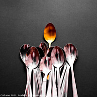 Buy canvas prints of A luxury golden spoon stands out from the rest of the simpler an by Joaquin Corbalan