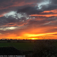 Buy canvas prints of Fiery winter Sunset  by louise stanley