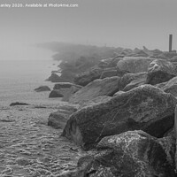 Buy canvas prints of Lost sea groyne on a frosty foggy morning  by louise stanley