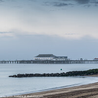 Buy canvas prints of Clacton Pier as the Morning mist clears by louise stanley