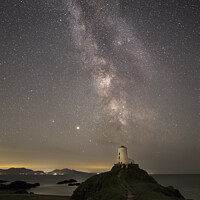 Buy canvas prints of The milky way at Llanddwyn island, Anglesey, Wales by Katie McGuinness