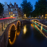 Buy canvas prints of Amsterdam Canals at night by Katie McGuinness