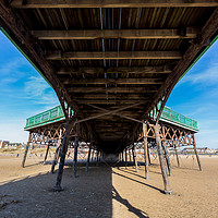 Buy canvas prints of Underneath Lytham St Annes Pier by Katie McGuinness