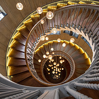 Buy canvas prints of Heals Department Store Spiral Staircase, London by Katie McGuinness