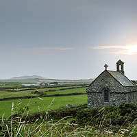Buy canvas prints of The isolated St Non's Chapel with the sun setting  by David Wall